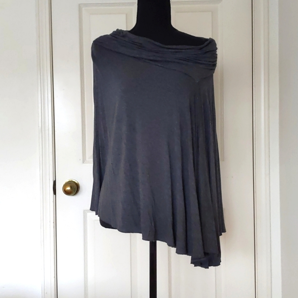 NWOT. 100% Rayon Poncho Shawl.